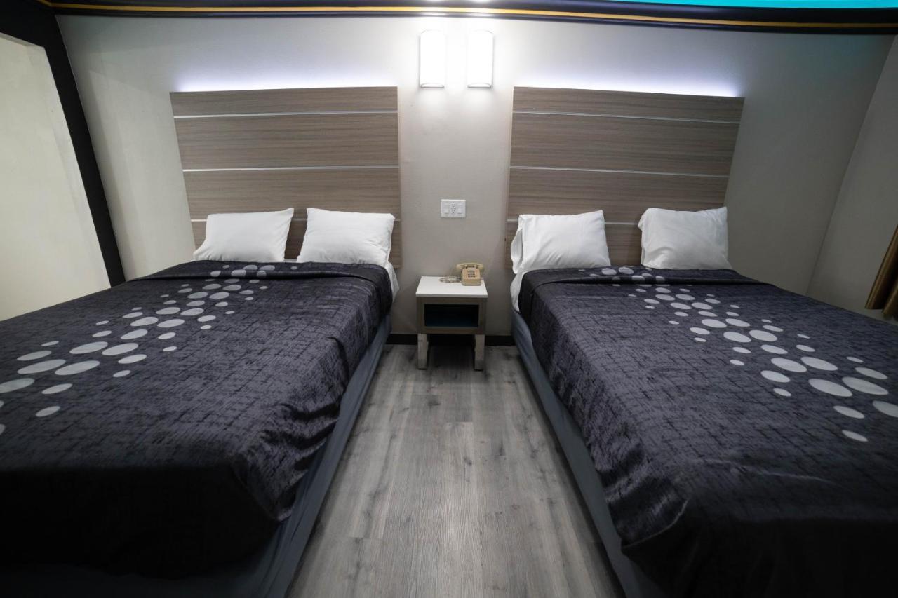 Artesia Motor Inn Белфлауър Екстериор снимка