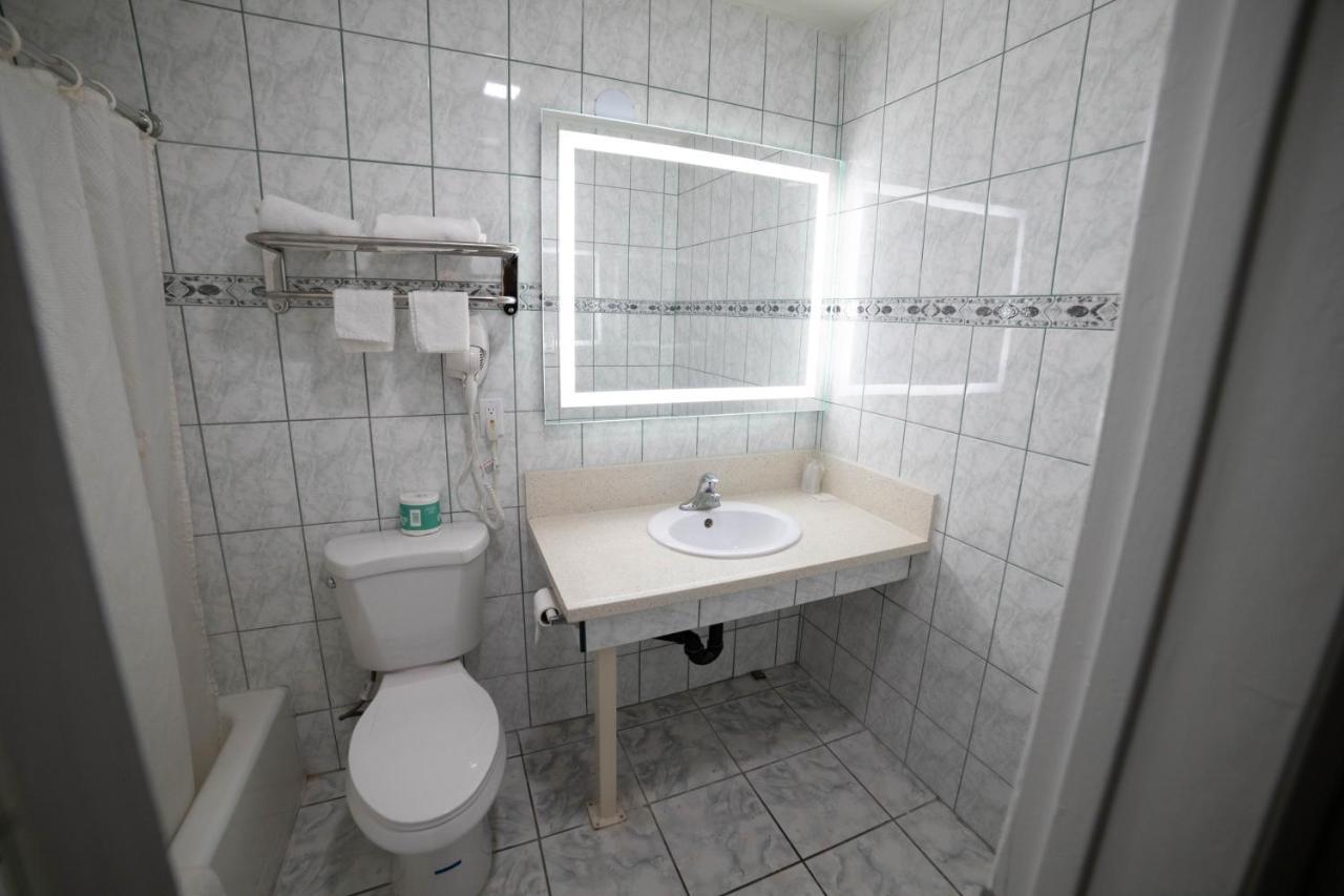 Artesia Motor Inn Белфлауър Екстериор снимка